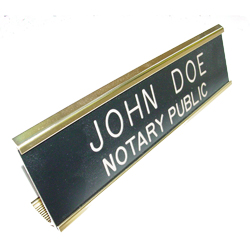 Washington notary desk signs are an essential part of presenting a professional image in the modern day work environment. This elegant, brass metal desk sign engraved with your name and the wording 'Notary Public' on an acrylic plate will make a fine addition to your office. This sign can be customized with up to two lines. Please type in any special customization instructions in the instruction box at checkout.